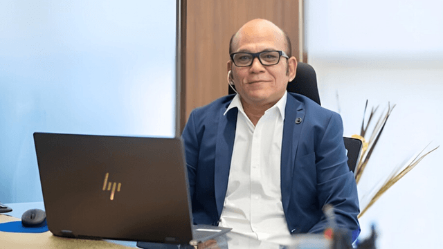 "Anup Singh, founder of dLife Healthcare, leading innovative metabolic health solutions, sitting at his desk, exemplifying leadership and expertise."