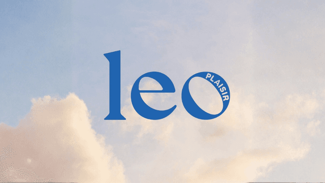 LEO Plaisir logo displayed against a soft cloudy sky background.