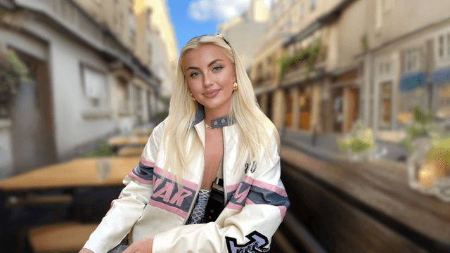 Elsa Thora poses confidently on a European street, embodying authenticity as Hinge’s most liked woman.