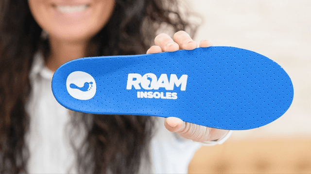 Technician crafting custom insoles from foot scan, highlighting personalized orthotics, at-home process, professional quality, and comfortable support for everyday mobility and wellness.