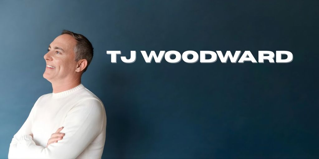 Portrait of TJ Woodward smiling against a blue background with his name displayed prominently.