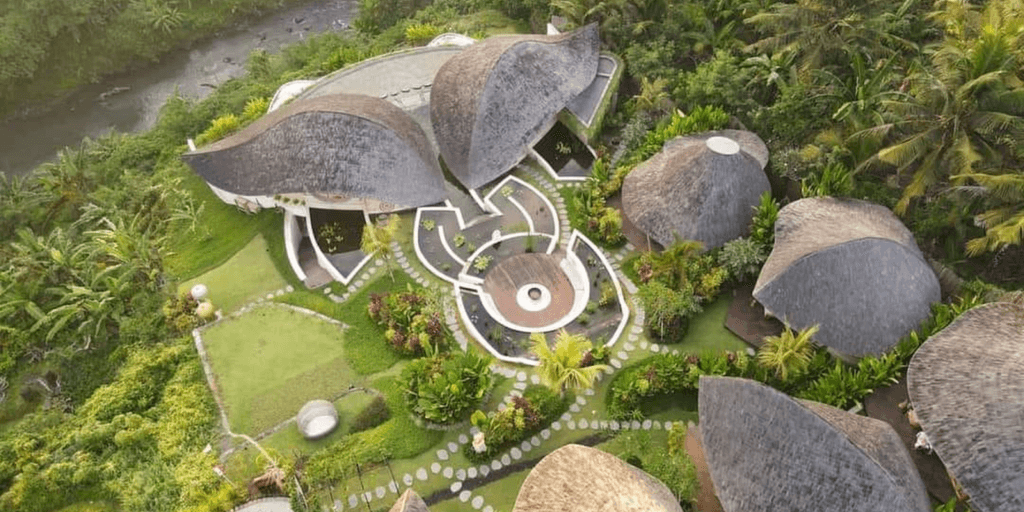 A tranquil Bali landscape with rice terraces and mountains, representing Soul Bliss Journeys' transformative and sustainable retreat experiences.