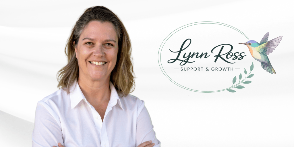 Woman smiling in a white shirt with a logo for Lynn Ross Support & Growth