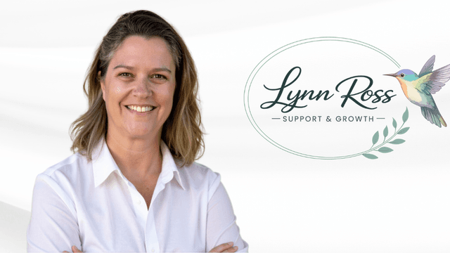 Woman smiling in a white shirt with a logo for Lynn Ross Support & Growth