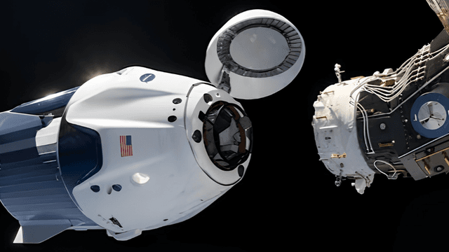 Crew Dragon spacecraft docking with the International Space Station in outer space