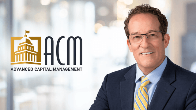 Businessman in a suit smiling beside a logo for Advanced Capital Management