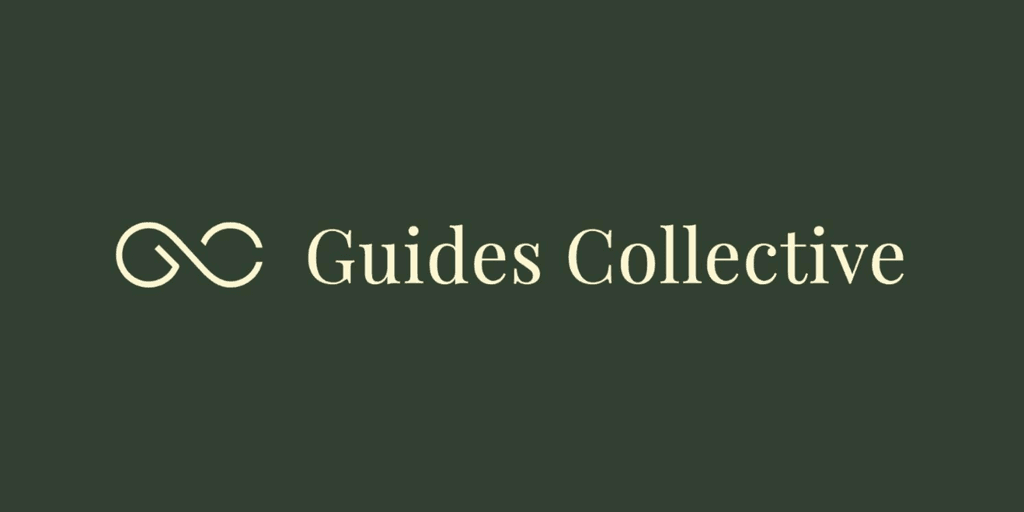Logo of Guides Collective featuring intertwined symbols and elegant typography on a dark background