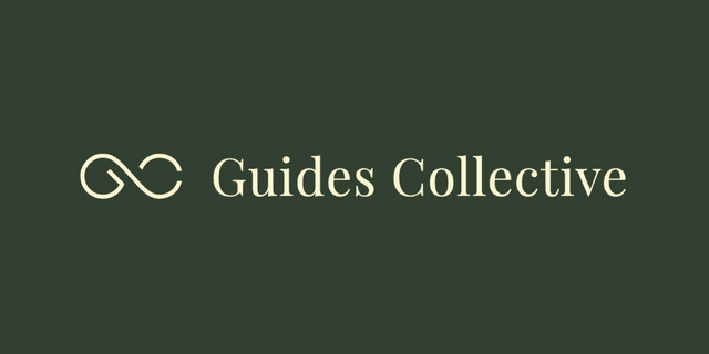 Logo of Guides Collective featuring intertwined symbols and elegant typography on a dark background