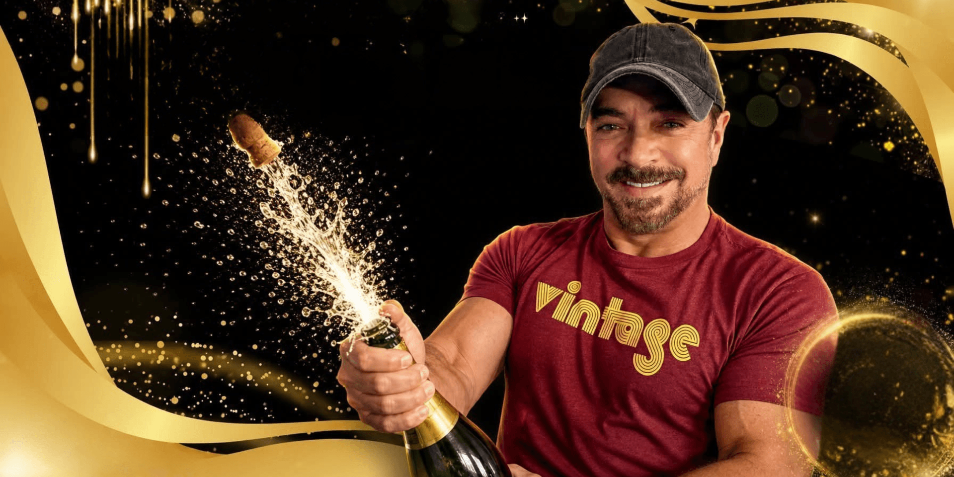 Smiling man in a cap opening champagne with sparkling bubbles around him