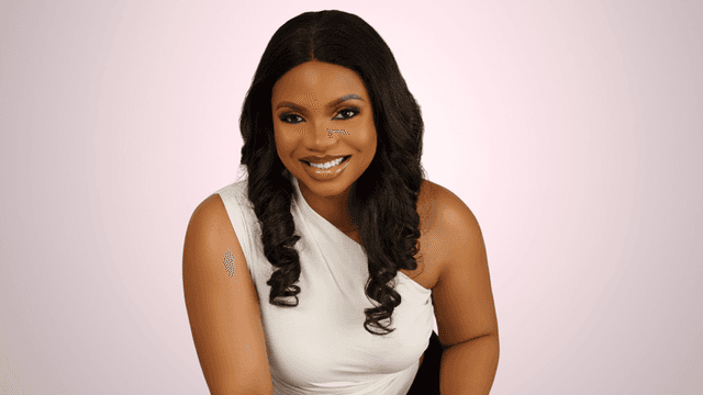 Ruth Aragbada, smiling confidently in a white top, embodies strength and transformation through her holistic wellness brand, Cura Mind Experience.