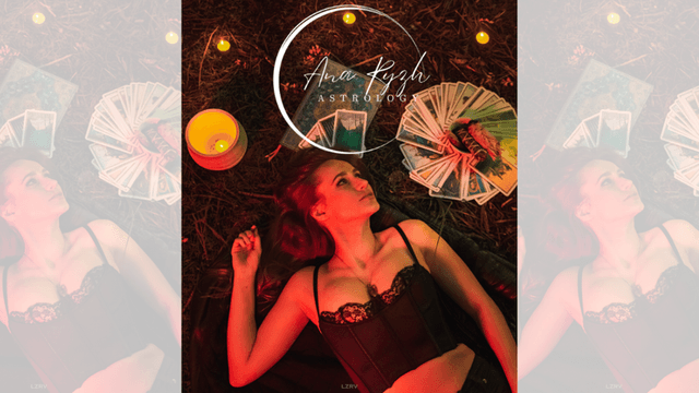 Anastasia Ryzhkova, astrologer, surrounded by tarot cards and candles, embodies the blend of astrology, creativity, and healing.