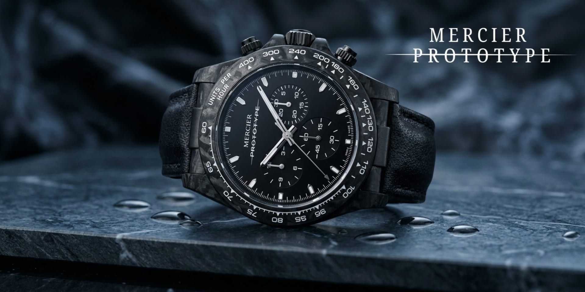 Mercier Prototype Manx luxury watch displayed on stone surface with water droplets and black leather strap.
