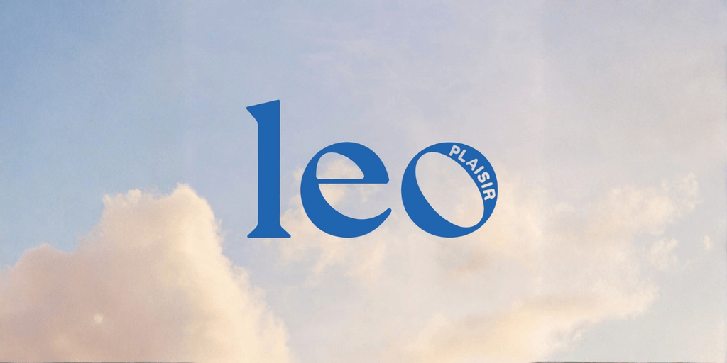 LEO Plaisir logo displayed against a soft cloudy sky background.