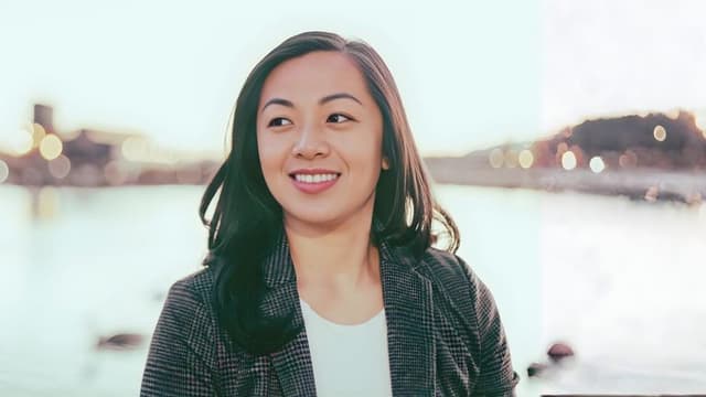 Portrait of Ellie Avancy, founder of #healPinas, outdoors near the waterfront.