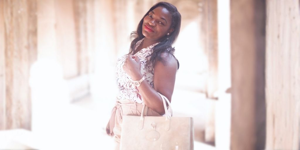 Priscilla Tshibemba-Petit, founder of Voilà The Budget, empowering others through financial education and debt-free living while balancing her career as a legal counsel.