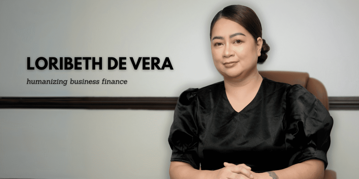 Loribeth De Vera seated, promoting her mission to humanize business finance through Save Financial Services.