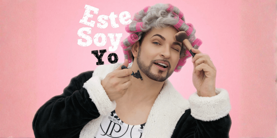 John Paul Padilla, wearing a robe and curlers, applies makeup and holds a razor, embodying his self-love anthem.