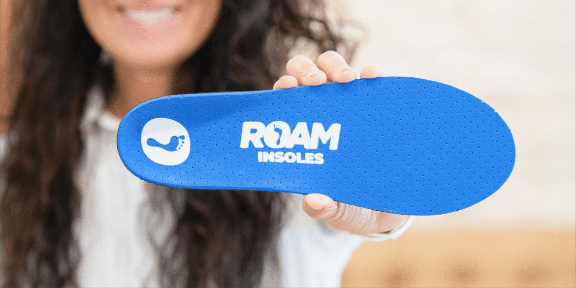 Technician crafting custom insoles from foot scan, highlighting personalized orthotics, at-home process, professional quality, and comfortable support for everyday mobility and wellness.