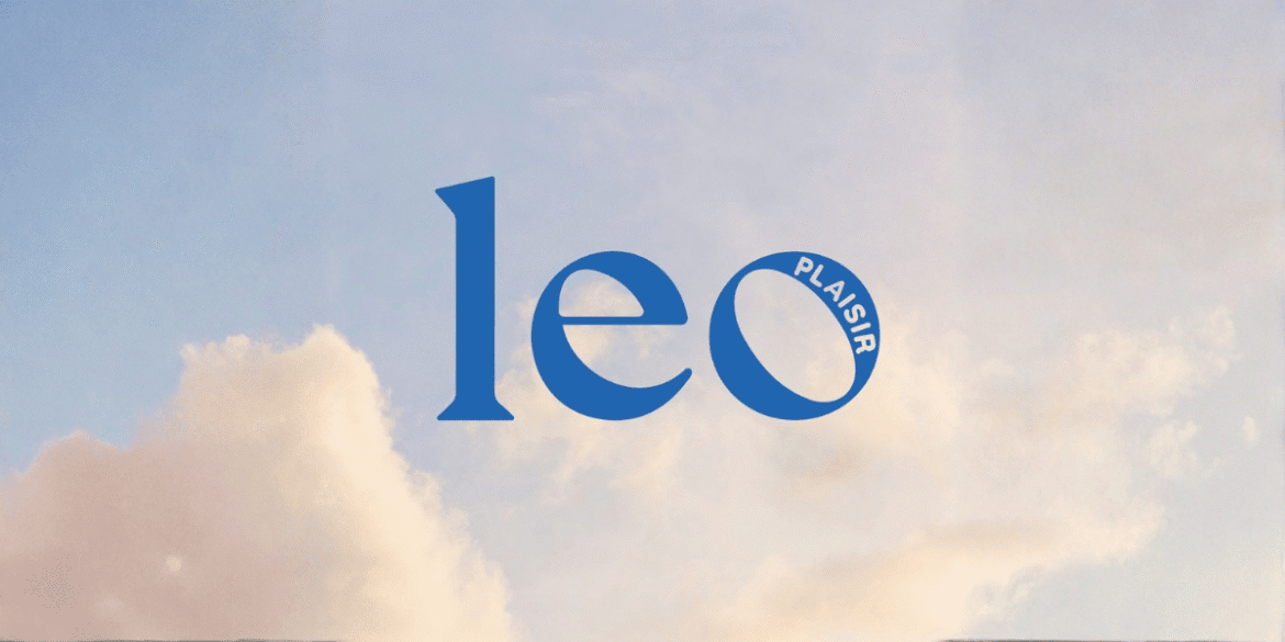 LEO Plaisir logo displayed against a soft cloudy sky background.